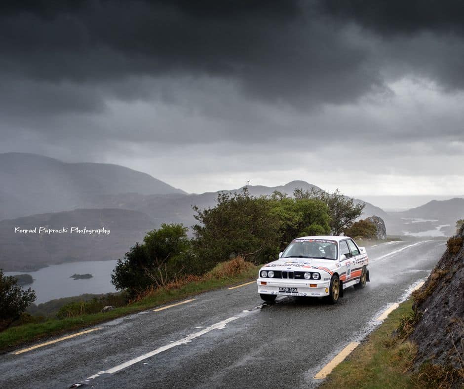 Rally car with a backdrop of the Killarney Mountains